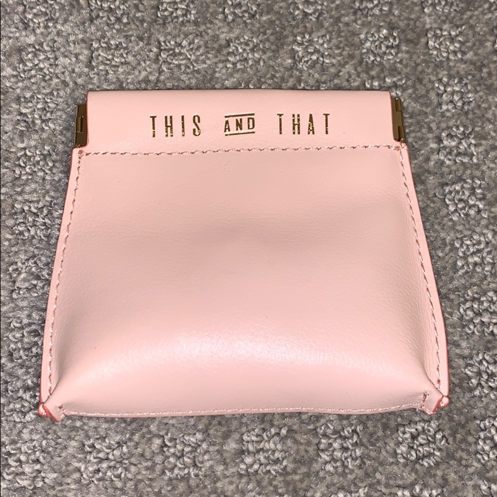 Jet set mini pouch